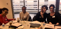 students and professionals smile