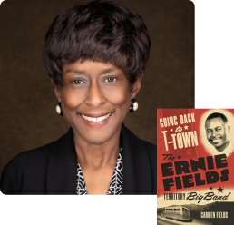 carmen fields headshot with books